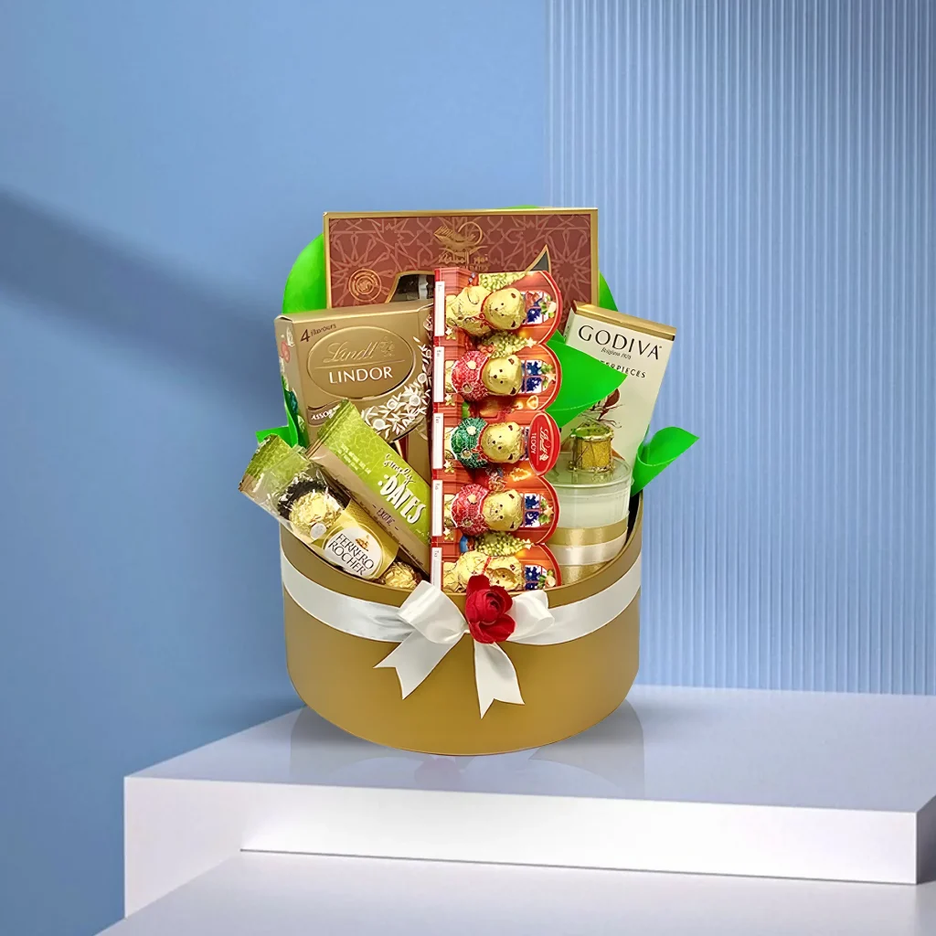 Santa's Box of Treats with chocolates, dates & candle in UAE